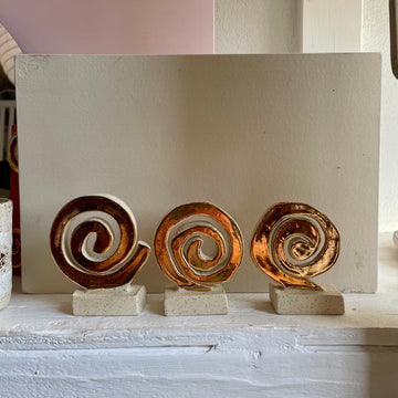 A Ceramic Spiral Figurine